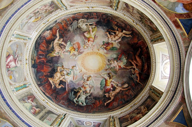 Renaissance fresco ceiling depicting angels and divine battle in the Vatican Museums, Rome – religious artwork to discover during Jubilee 2025