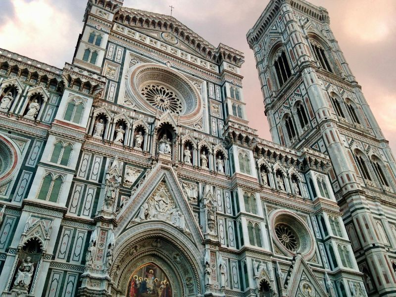 Facade of Florence Cathedral with Giotto’s Bell Tower at sunset